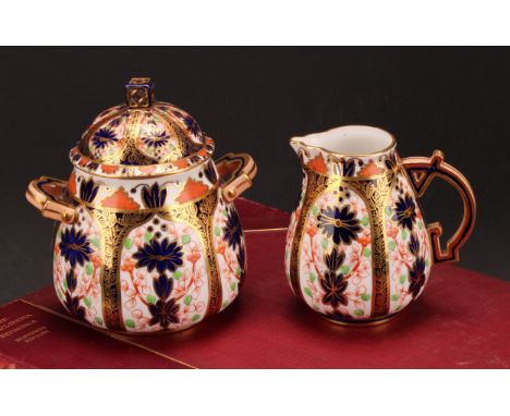 A Derby Crown Porcelain Company Imari palette 1128 pattern milk jug and two handled sucrier and cover, 14cm, printed mark, ye