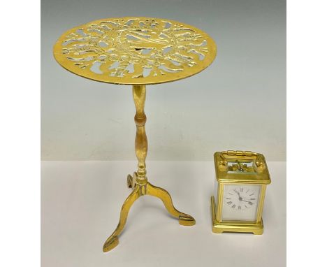 A French SF brass carriage clock, the white dial set with Roman numerals, engraved ‘Seymour 26/07/05’ 12cm high; a brass pede