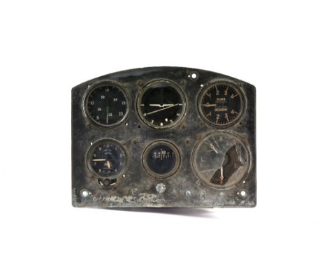 WWII Instrument panel believed to have come from a Spitfire, fitted with original instruments some dated 43-44. Glass damaged