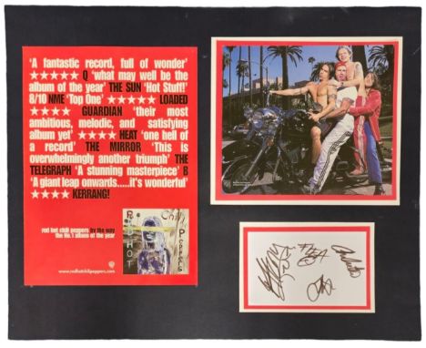 Red Hot Chilli Peppers mounted and framed signature piece including signed white card by Anthony Kiedis, Chad Smith, Flea and