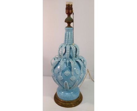 A large vintage continental majolica table lamp in blue glaze, 60cm tall.