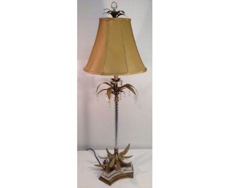 A large continental table lamp with metal leaf & glass drop design, 110cm tall.