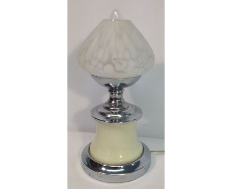 A small vintage French table lamp with cream base.