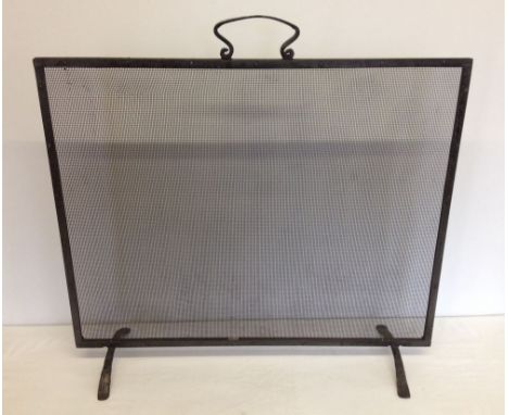 A vintage firescreen.