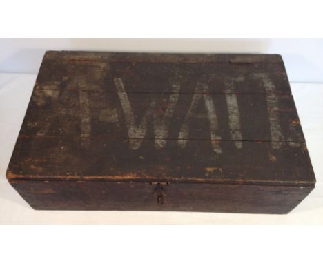 A vintage wooden toolbox marked A-Watt to lid.
