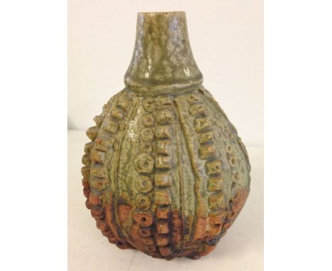A Bernard Rooke studio pottery sea urchin style lamp base in green & brown. 16cm tall.