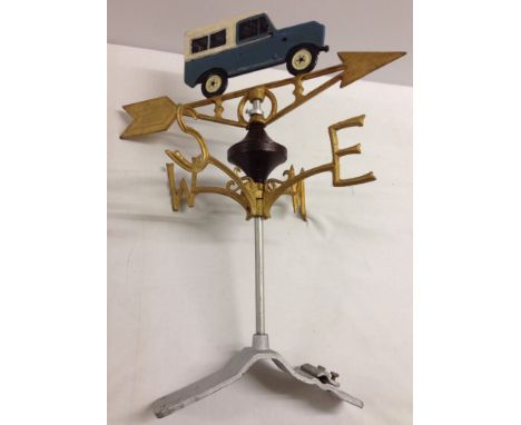 A cast iron Land Rover weather vane.