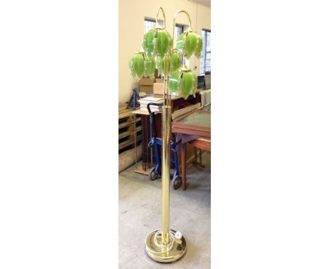 Gold coloured standard lamp with 5 green glass shades.