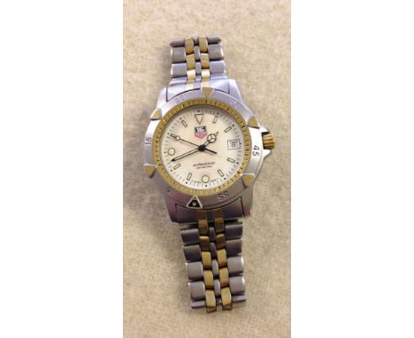 A Tag Heuer gentlemens watch with stainless steel case and strap. 955.706G in good working order. Light wear to strap, no scr