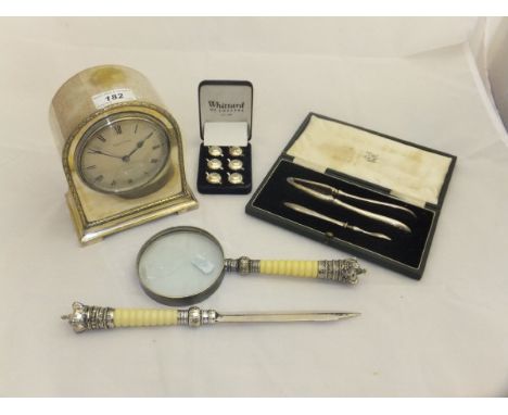 A mid 20th Century Mappin & Webb plated mantel clock, the silvered dial set with Roman numerals and inscribed "Mappin & Webb 