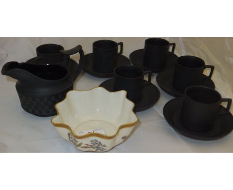 A Royal Worcester blushware handkerchief bowl, decorated with flowers, together with six Wedgwood black basalt ware coffee ca
