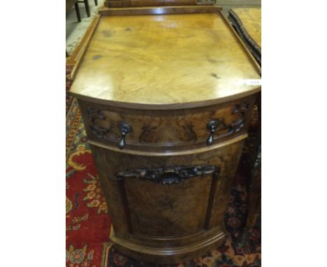 A late 19th / early 20th Century walnut pot cupboard with single drawer above bow fronted cupboard door enclosing shelf