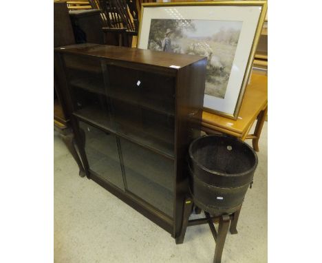 A Herbert E Gibbs Limited Autograph Furniture bookcase cabinet, together with a similar bookcase, an R. A. Lister & Co. Limit