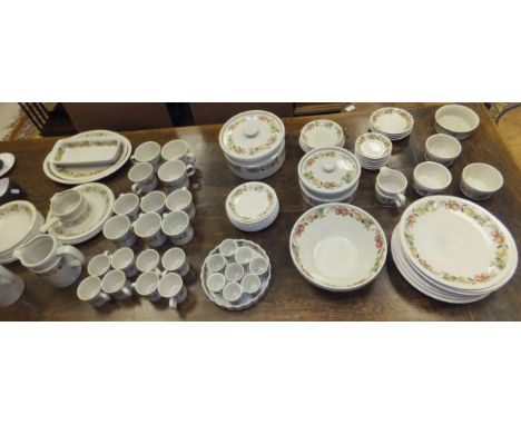 A collection of Wedgwood "Quince" pattern dinner and tea wares to include two lidded tureens, coffee pot, jugs, fruit bowl, d
