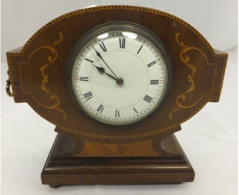 An oak cased Napoleon hat shaped mantel clock with Arabic numerals to the steel dial, an early 20th Century mahogany and marq