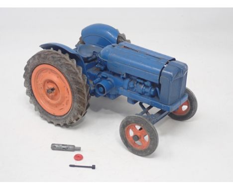 An unboxed Chad Valley Fordson Major Tractor, lacking steering wheel 