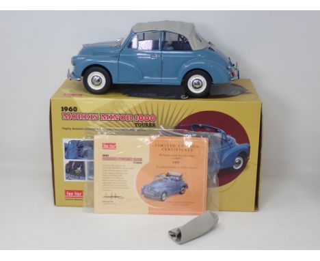 A boxed Sun Star 1/12 scale diecast model of a Morris Minor 1000 Tourer 