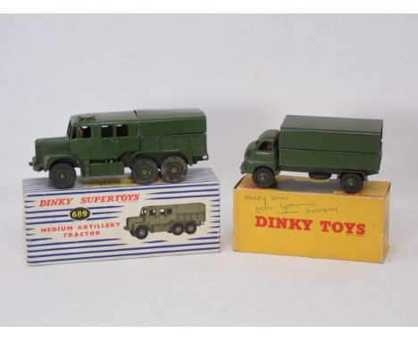 A boxed Dinky Toys No.621 3-ton Army Wagon, a boxed No.689 Medium Artillery Tractor and a boxed No.692 5.5 Medium Gun 