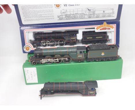 A boxed Bachmann 00 gauge V2 Locomotive and a spare shell and an unboxed  Hornby A3 'Dick Turpin' on BR livery 
