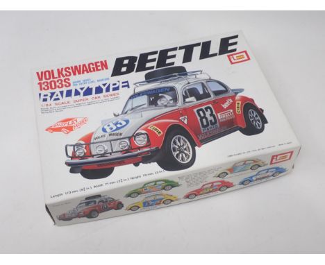 An Imai 1/24 scale plastic Kit of Volkswagen 1303S Beetle, boxed and parts in sealed bags 