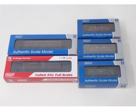 Two boxed Dapol N gauge GWR Siphon H Wagons, two boxed GWR Fruit Wagons and an SR Van 