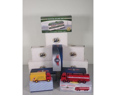 A boxed Atlas Dinky Toys No.943 'Esso' Leyland Octopus Tanker, a boxed No.920 Guy 'Heinz' Van, three boxed Atlas Classic Coac