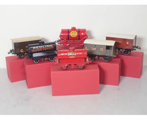 Six Hornby 0 gauge Wagons including 'Redline' Petrol Tank, 'Shell' Petrol Tank, 'Colas' Petrol Tank, No.1 Milk Traffic Van, F