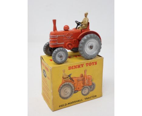 A boxed Dinky Toys No.301 Field-Marshall Tractor with silver hubs 