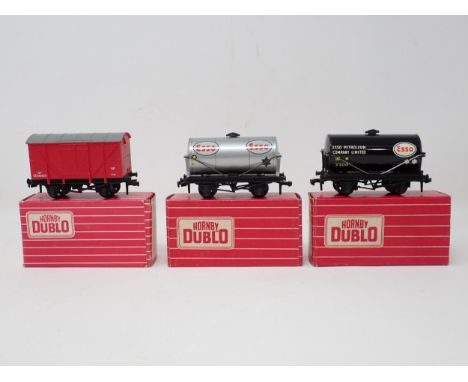 Three Hornby Dublo Wagons comprising 4680 black 'Esso' open gear Tank, 4318 Packing Van and 4676 silver 'Esso' open gear Tank