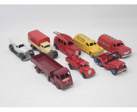 Eight unboxed Dinky Toys including National Benzole Tanker, Esso Tanker, Jeep, etc., some repainted 