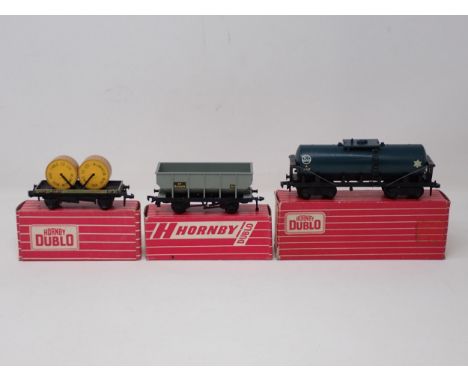 Three Hornby Dublo Wagons comprising 4685 Caustic Liquor Wagon, 4644 21 ton Hopper Wagon and 4646 Low-sided Wagon with cable 