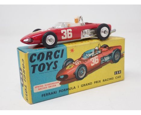 A small collection of Corgi Toys cars, comprising a No. 314 Ferrari  Berlinetta 250 Le Mans, a No. 22