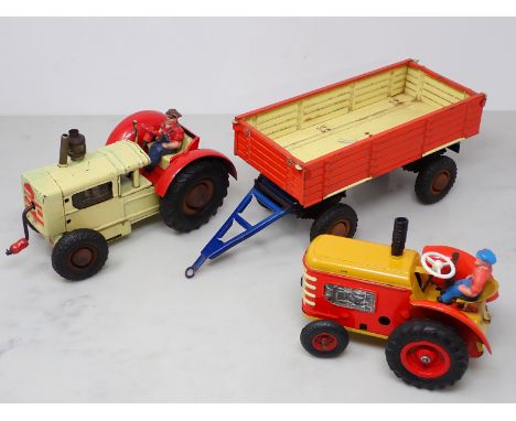 Two German Gama tinplate clockwork Tractors and a Trailer 