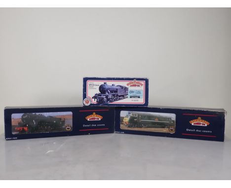 A boxed Bachmann 00 gauge WD 8F 2-8-0 Locomotive in B.R. austerity livery, a boxed Bachmann Class 42 Warship 'Monarch' and a 