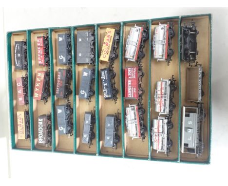 Twenty four unboxed Bachmann and Mainline 00 gauge Wagons, some with weathering 