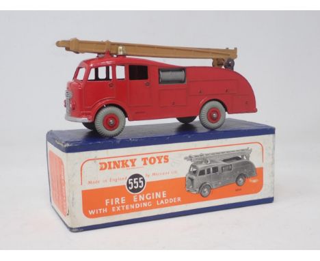 A rare boxed Dinky Toys No.555 Fire Engine with tan extending ladder 