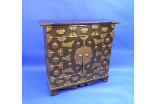 An Antique Korean Cabinet With Brass Butterfly Hinges And