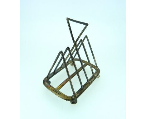 A Victorian silver five bar Toastrack, in the style of Dr. Christopher Dresser, by Henry Wilkinson & Co., hallmarked London, 