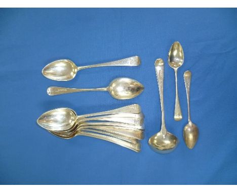 A George III part-set of seven silver Dessert Spoons, hallmarked London, 1817, Old English pattern, crested, 7in (18cm) long,