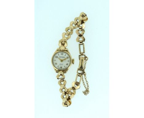 A 9ct gold Rotary lady's Wristwatch, with Swiss 17 Jewels Incabloc movement, the circular silvered dial with Arabic and baton