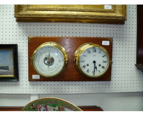 A Schatz brass bulkhead-style Clock and Barometer, both set on a brass-mounted mahogany board, each 6in (15cm) diameter.