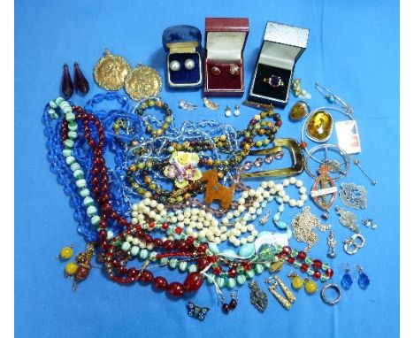 A collection of Costume Jewellery, including a modern silver mounted amber brooch, a silver brooch in the form of a tree, a h