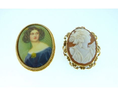 A shell cameo Brooch, of a Grecian lady in a 9ct yellow gold scrolling mount together with a gilt metal brooch with printed f