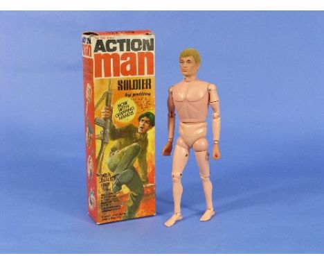 Action Man; an action man doll with "realistic hair", boxed, and another Action Man doll, together with an Action Man Command