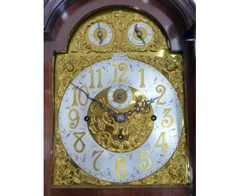 An Edwardian quarter chiming Longcase Clock, signed W. Scott, Glasgow, the ornately inlaid mahogany case with shallow arched 