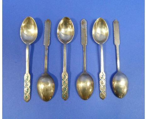 A Liberty & Co. set of six silver and enamel Teaspoons, hallmarked Birmingham, 1953, in Liberty fitted presentation case.  