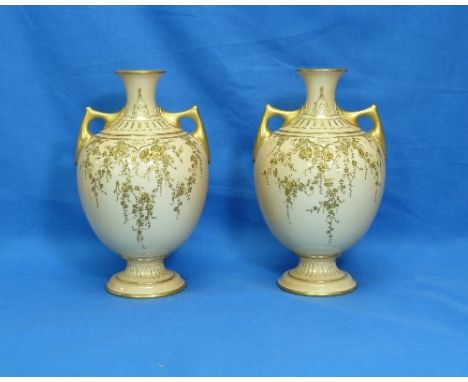A pair of Royal Worcester 'blush' Vases, circa 1894, of two-handled baluster form, decorated in gilt with trailing flowers, p