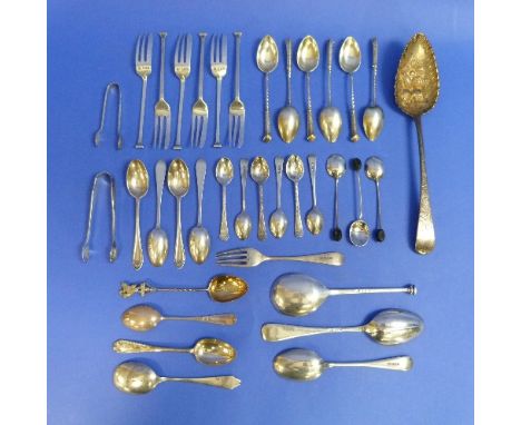 A George III silver Berry spoon, by Thomas Wallis, hallmarked London, 1806, of traditional form with fruit embossed bowl and 
