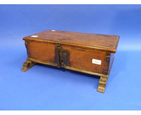 A 17thC fruitwood Bible Box, of hinged rectangular form on sled feet, 19in (48cm) wide.