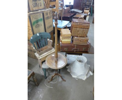 A mahogany standard lamp, mahogany coffee table, painted kitchen chair, two stools, four wicker boxes and a travel trunk